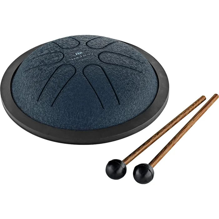 A small steel navy colored tongue drum on a white background with two mallets.