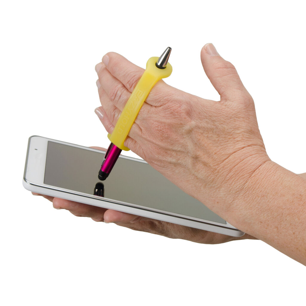 A hand using a stylus on a touchscreen phone with a yellow EasyHold cuff.