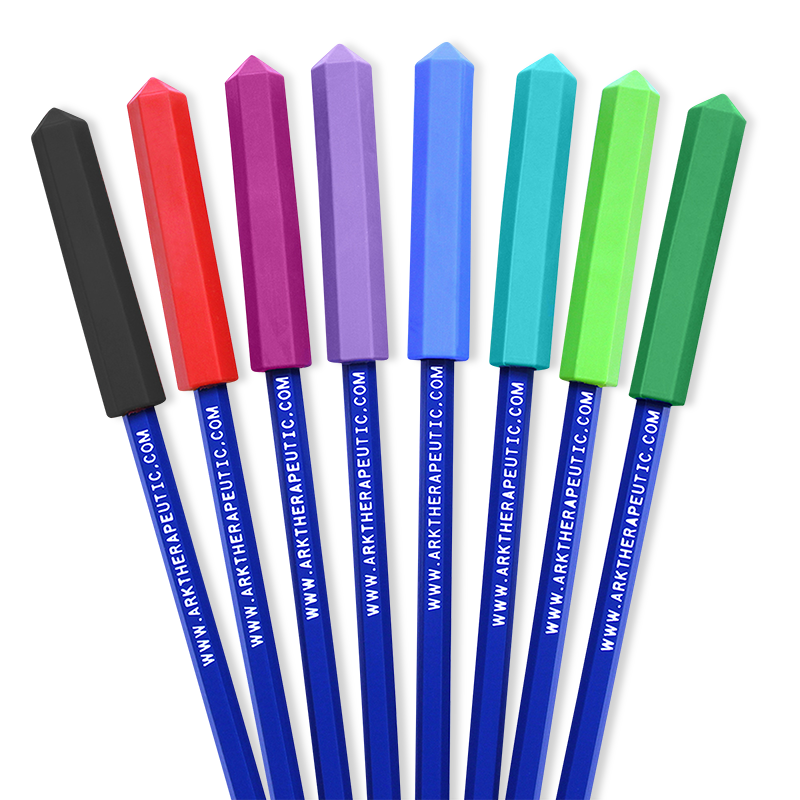 Chewable pencil toppers in various bright colors fanned over a white background.